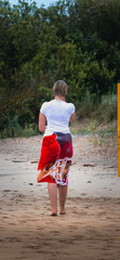 parent and child,wet white t-shirt, woman in the rain on the beach, female silhouette, figure