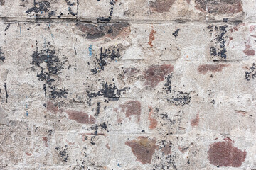 Red, White, Green, Pink, Paint, Mold, Wall Background. Old Grungy Brickwork Horizontal Texture. Brickwall Backdrop. Structure With Broken Stucco And Plaster.