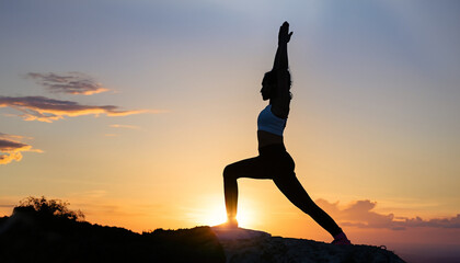 silhouette of a woman doing yoga exercises