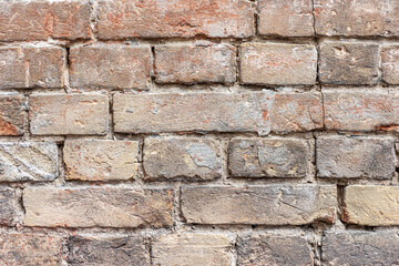 Red, White, Green, Pink, Paint, Mold, Wall Background. Old Grungy Brickwork Horizontal Texture. Brickwall Backdrop. Structure With Broken Stucco And Plaster.