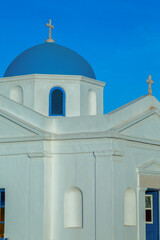 White and blue Greek orthodox church in Mykonos, Cyclades, Greece.
