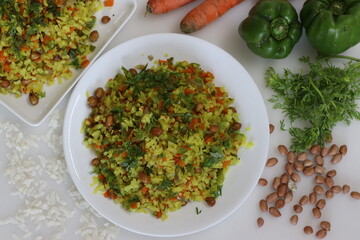 Vegetable Poha is a quick breakfast or snack made of beaten rice or flattened rice along peanuts,...