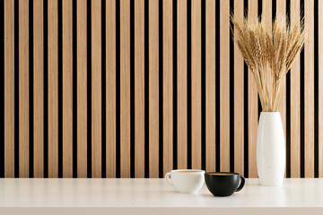 Espresso coffee on the table and wood wall background
