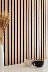 Espresso coffee on the table and wood wall background
