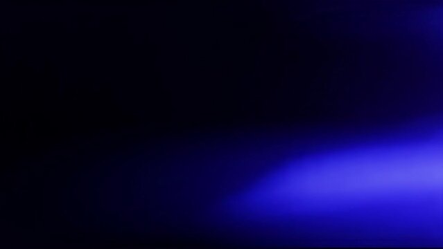 Realistic blue strobe light leak on half screen, for overlay effect, looping video.
