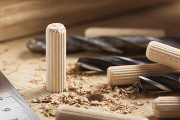 hole in wooden oak board for wooden dowel. carpentry industry.
