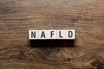 NAFLD Non Alcoholic Fatty Liver Disease, word concept on building blocks