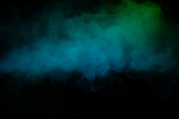 Blue and green steam on a black background.
