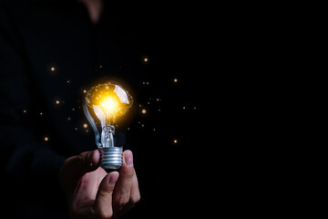 Businessman an holding illuminated light bulb with brain inside. New idea innovation concept, Business Bright idea concept, Creative and innovation inspiration, New idea business start up,