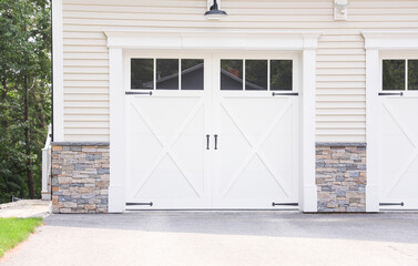 Symbolic haven of aspirations and security, a home garage embodies dreams, craftsmanship and shelter, the heart of domestic ambition 