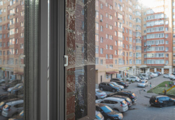 Mosquito wire screen protects the apartment from the penetration of spiders, flies, insects and dust. Cobweb or spider web outside the window.