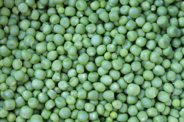 Lots of fresh green peas. Green peas background