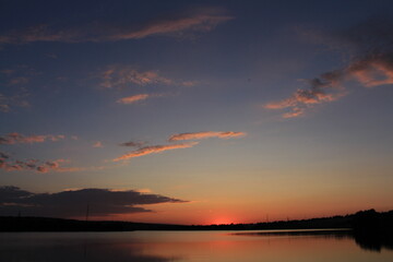 Fototapeta premium A sunset over a lake