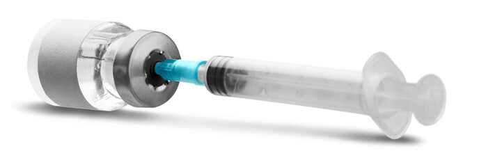 Covid-19 vaccine bottle with a blue liquid and taking the vaccine from it with a syringe