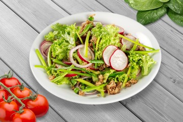 Fresh tasty vegetable salad in plate