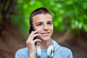 photo boy with a mobile phone in various poses, the concept of modern life