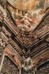 Milan, Italy- May 13, 2023: Church of San Bernardino on the bones, 18th centuryБ known for its ossuary, decorated with human skulls and bonesБ architectural detail is clad in human bones..