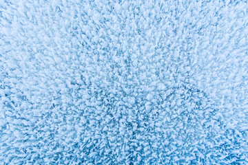 Fototapeta na wymiar frozen icy surface close up