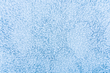 Fototapeta na wymiar frozen icy surface close up