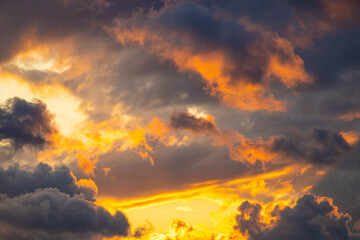 beautiful stormy sky with the sun peeping through