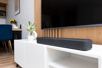 Soundbar in a modern home. Listening to music