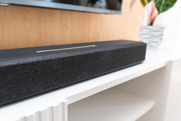 Soundbar in a modern home. Listening to music