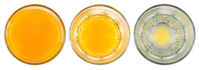 Fototapete Saft Three glasses with orange juice on an isolated background.  © Piotr