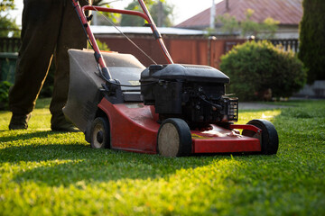 Lawn mover on green grass. Machine for cutting lawns.