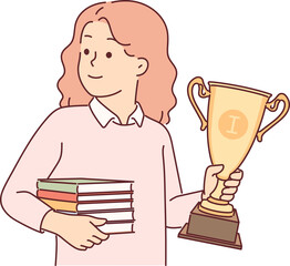 Schoolgirl with trophy gold cup and books in hands rejoices in victory in school olympiad