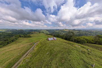 Aerial View of an Old Barn with Rusty Sheet Metal Roof near Filandia, Quindio, Colombia, Surrounded...
