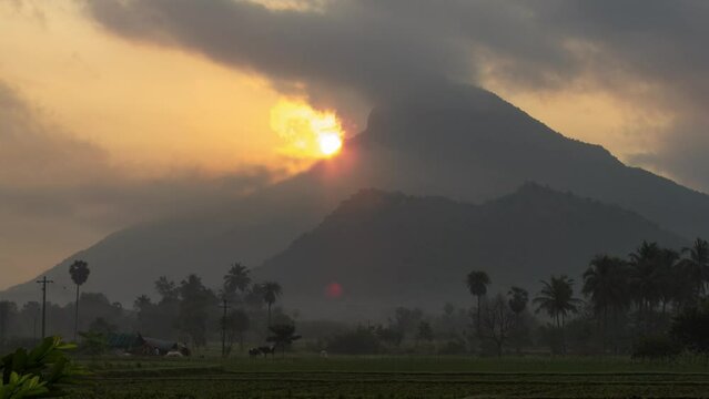 Clouds over Arunachala, holy hill located in Tiruvannamalai, Tamil Nadu, India. Time lapse