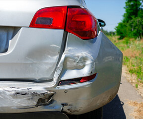 Vehicle damaged in a car accident, broken rear bumper, damaged components