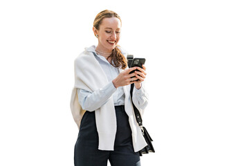 Communicates writes a message on a social network employee assistant woman uses the phone smiling...