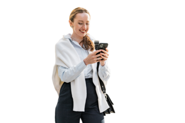 Communicates writes a message on a social network employee assistant woman uses the phone smiling in formal clothes working in the office. Transparent background, png.