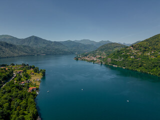 Nature of Italy Lake Orta view from a drone. Aerial View Forest Landscape in Summertime Day. Concept Wildlife and Nature Wide Shot 4k.