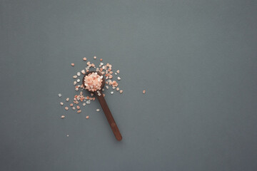 Raw whole dried pink Himalayan salt ion wooden spoon 