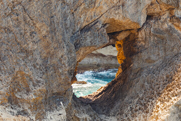 Big rock formation with a hole from arecibo cueva del indio in puerto rico 