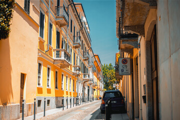 Urban Oasis: Charming street with buildings in a European city bathed in warm sunlight, the...