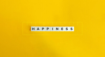 Quantifying or Measuring Happiness Concept Image. The Economics of Well-being. Word on Block Letter Tiles and Ruler Illustration on Yellow Background.