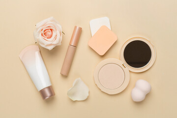 Composition with makeup products for skin tone on color background, top view