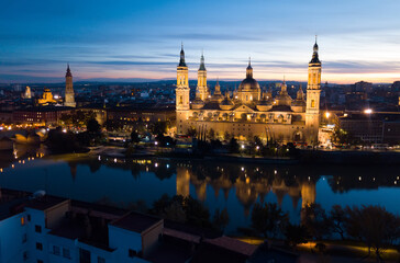 Fototapeta na wymiar Night cityscape of Spanish city Zaragoza (Saragossa) with Cathedral Basilica