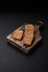 Delicious salted rectangular wheat croutons with salt and spices