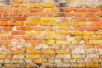 Weathered yellow and red brick wall, seamless pattern texture background. Generative AI