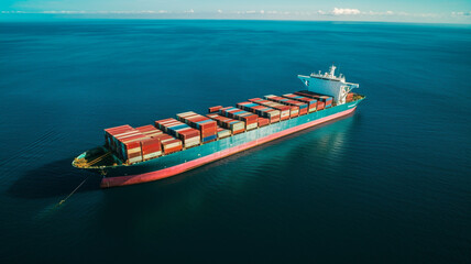Fototapeta premium Container ship in ocean, logistics and transport of shipping containers, global trade concept