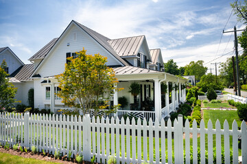 Average American residential home. Traditional American-style home with beautiful landscaping.