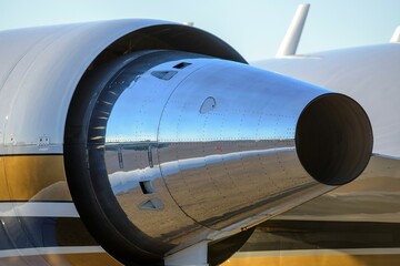 Obraz premium Incredible Close-Up of Jet Engine Power: Small Private Jet Airplane's Thrusting Propulsion in Stunning 4K Resolution