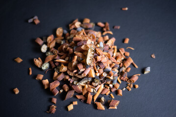 dried cochayuyo on a black board