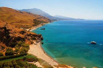 Obraz premium Preveli palm grove on the island of Crete in the Libyan Sea in Greece.