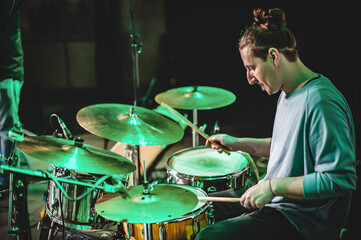 Obraz premium Drum music band drummer artist have solo live performance on a stage. Repetition and practice