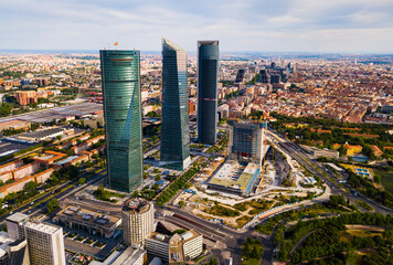 Aerial cityscape of Madrid with four modern business skyscrapers Cuatro Torres - obrazy, fototapety, plakaty